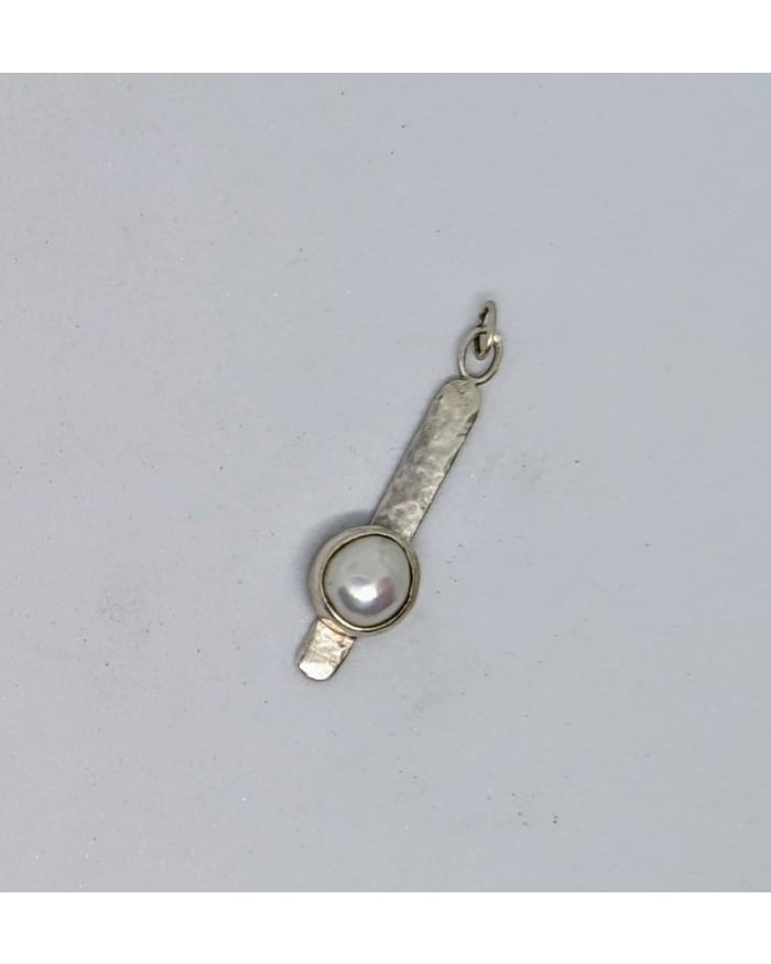 a silver and pearl necklace