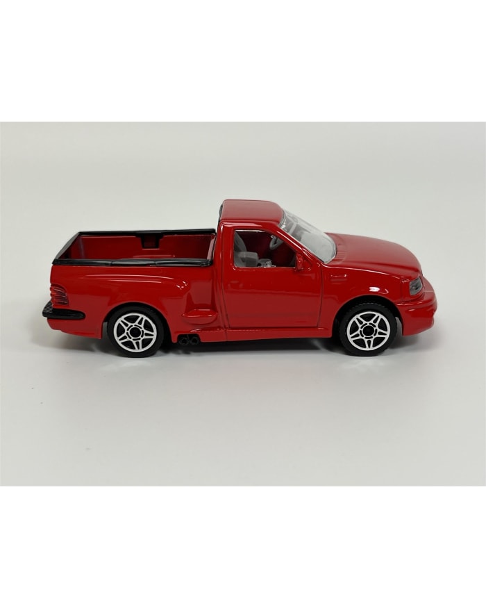 a red toy truck on a white background