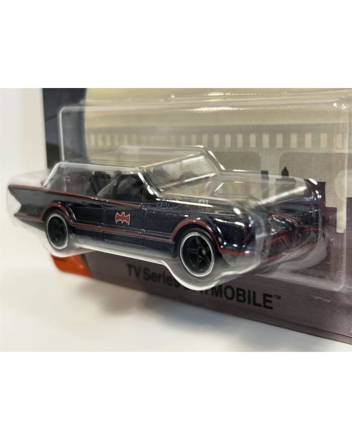 a toy car in a plastic package