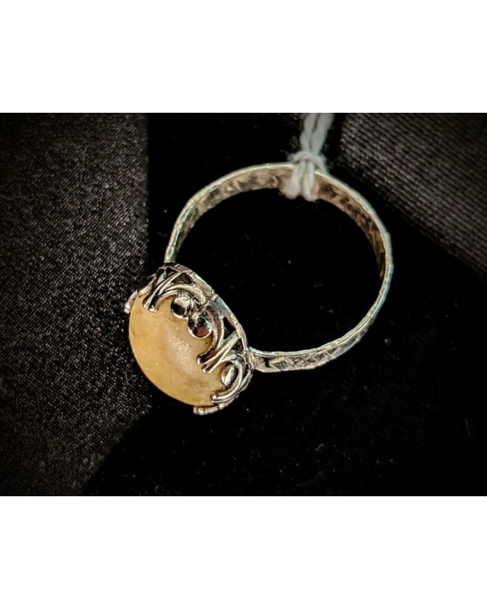 a ring with a stone on it