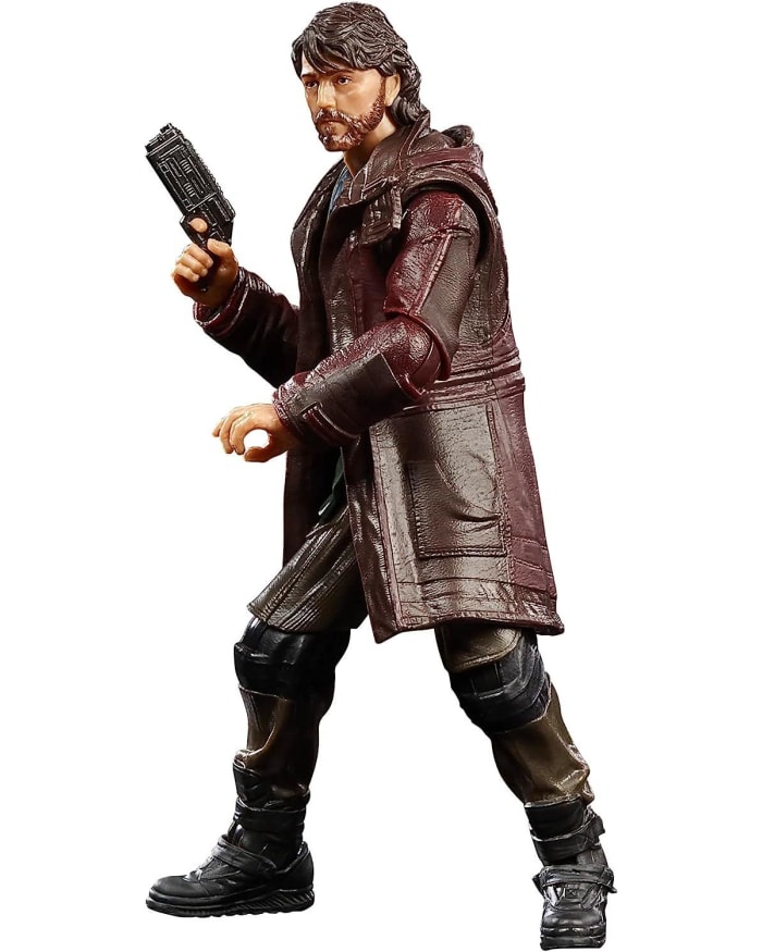 a toy figure of a man holding a gun