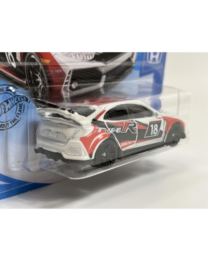 a toy car in a plastic package