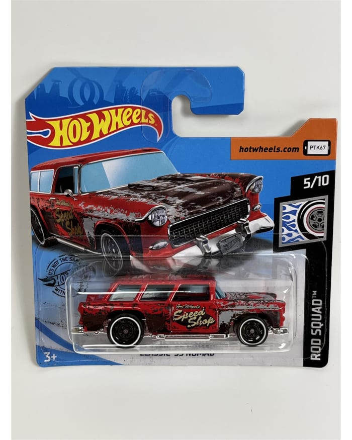 a red toy car in a package
