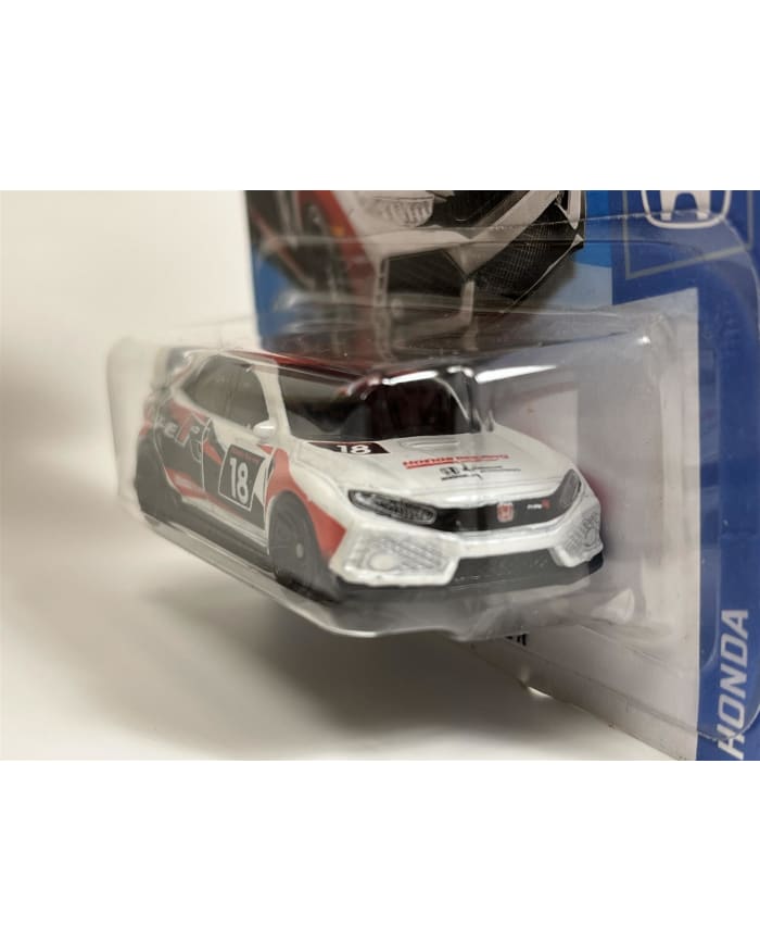 a toy car in a plastic package