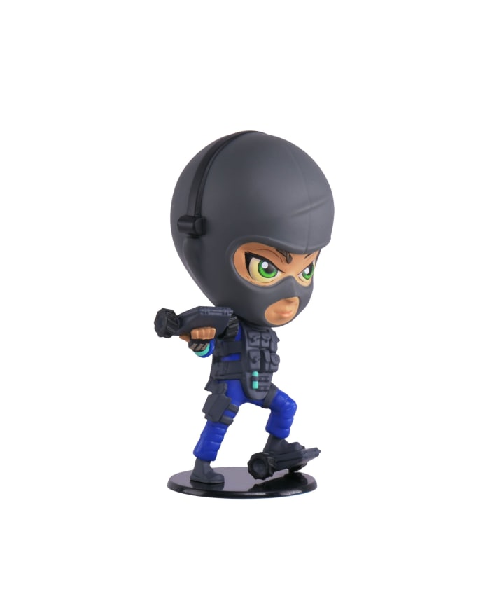 a toy figurine of a person wearing a black mask and blue pants