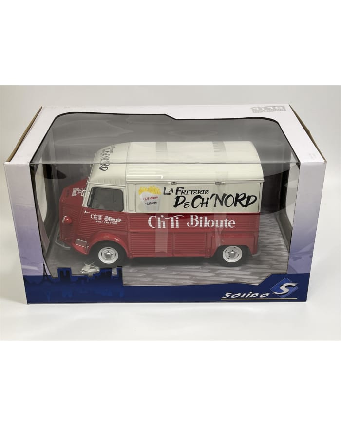 a red and white toy van in a clear plastic box