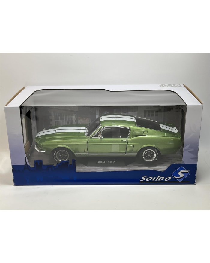 a green car in a box