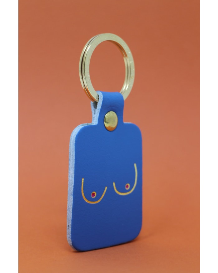 a blue key chain with a gold ring