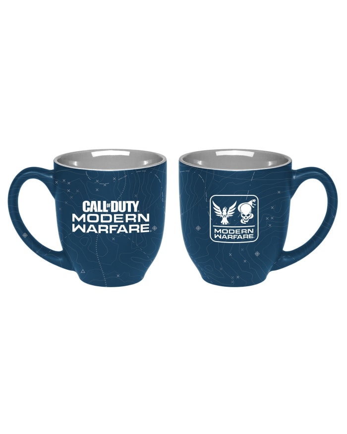 two blue mugs with white text