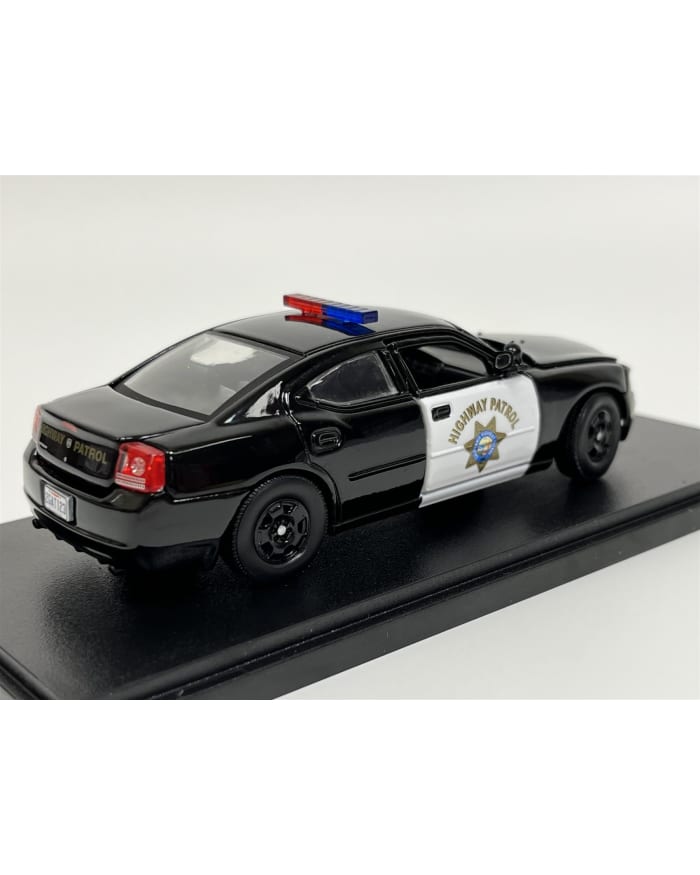 a black and white toy police car