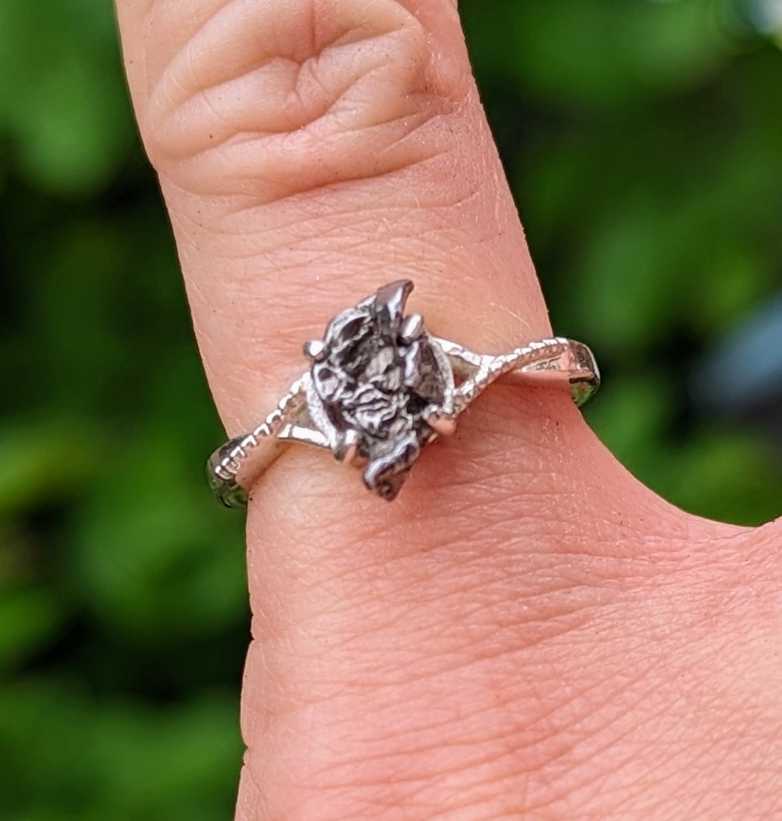 a close up of a ring on a finger