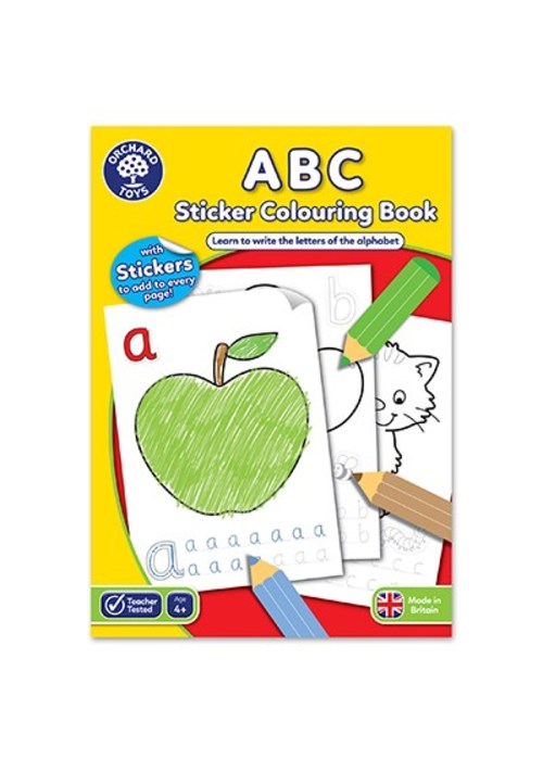 a book with a green apple and pencils