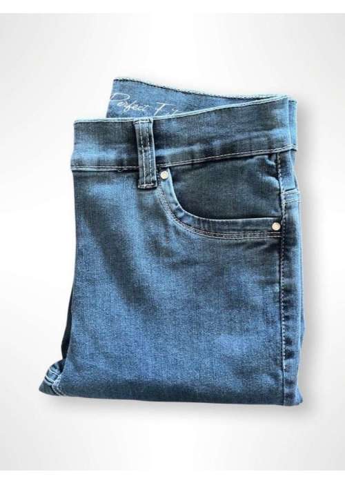 a folded blue jeans on a white background