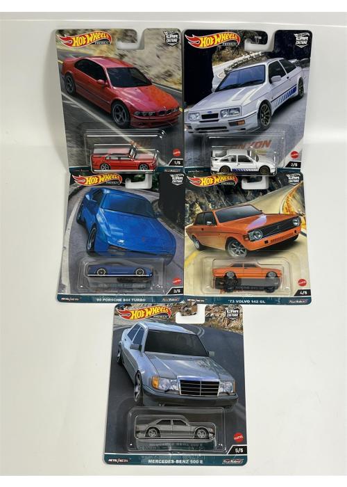 a group of hot wheels cars in packaging