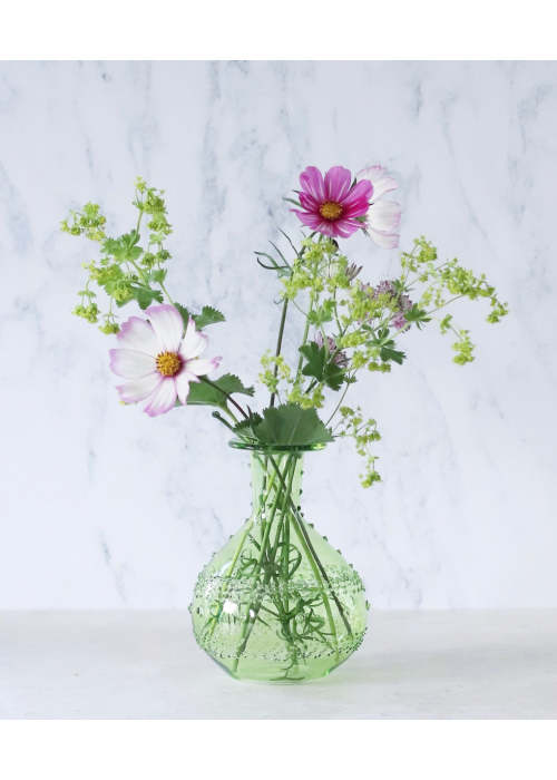 a vase with flowers in it