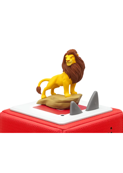 a toy lion on a red box