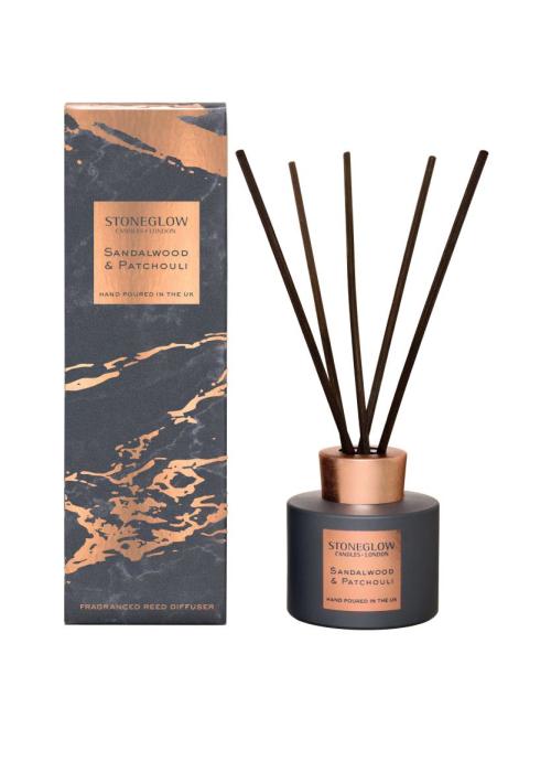 a bottle of reed diffuser with a box