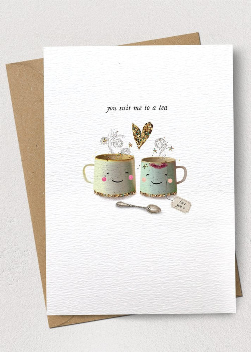 a card with a couple of mugs and a brown envelope