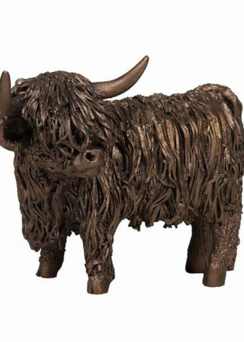 a brown statue of a yak