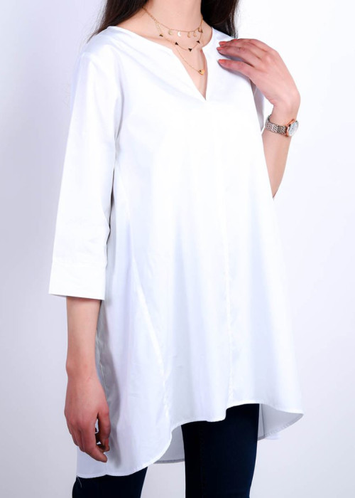 a woman wearing a white shirt