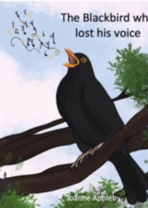 a bird singing in a tree