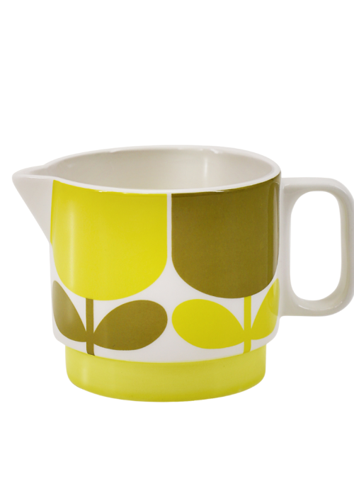 a yellow and white tea cup