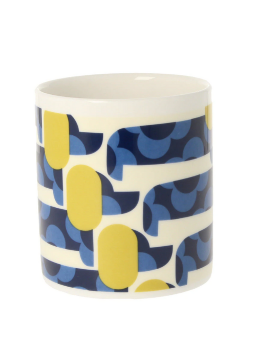 a white and blue mug with yellow and blue design