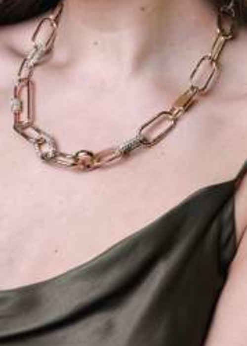 a woman wearing a necklace