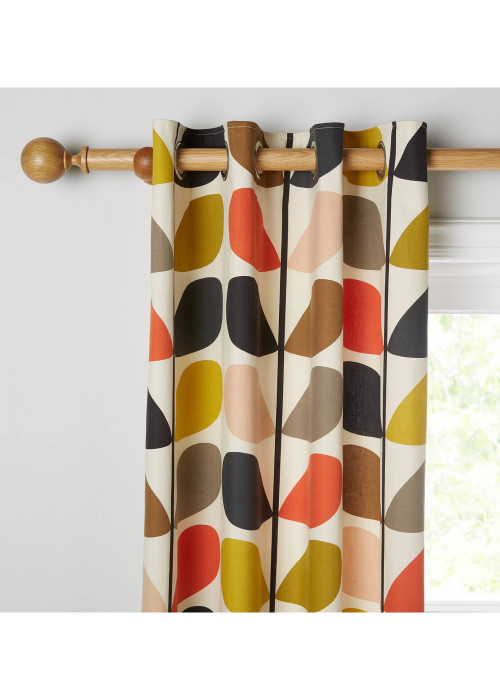 a colorful curtains on a rod