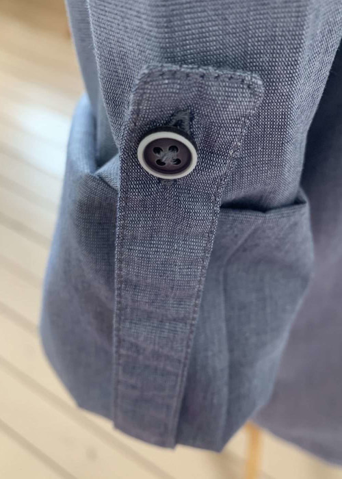 a close up of a button on a shirt