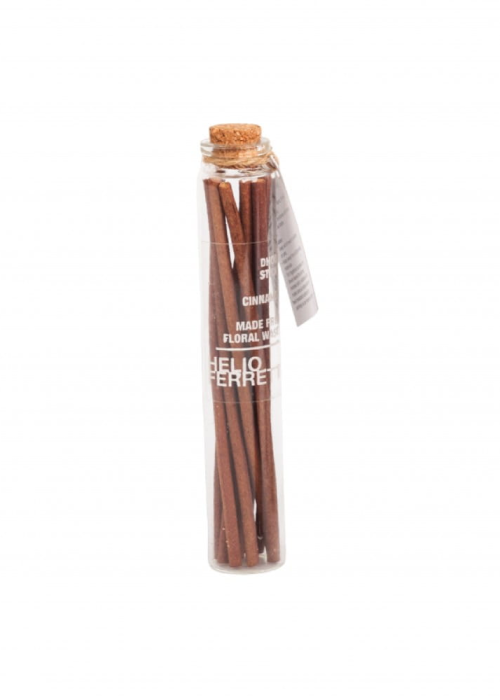 a bottle of brown sticks