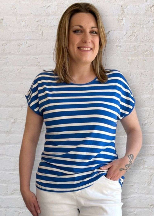 a woman in a striped shirt