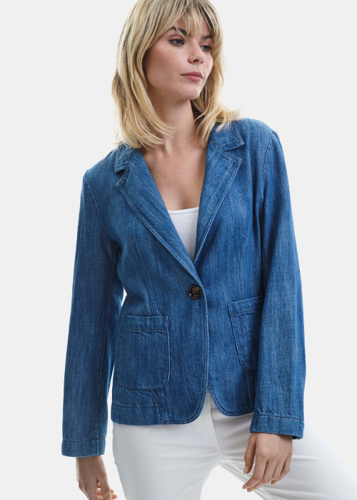 a woman in a blue jacket
