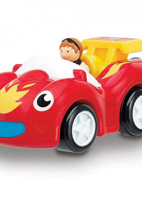 a red toy car with a person driving