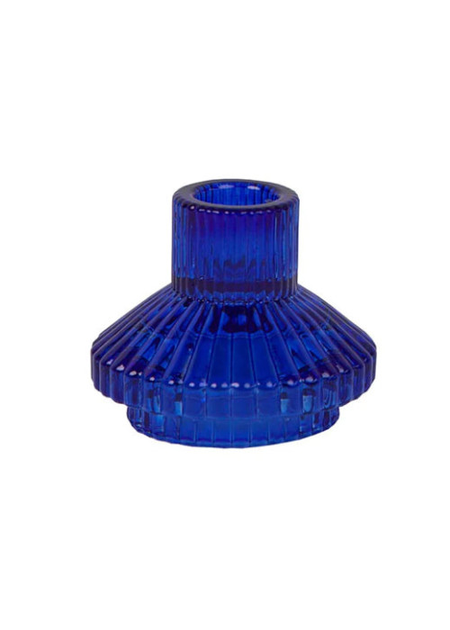 a blue glass candle holder