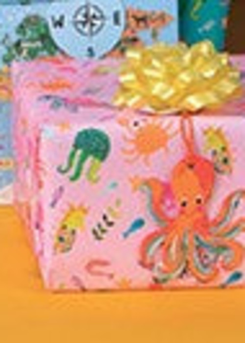 a pink wrapped gift box with a yellow bow