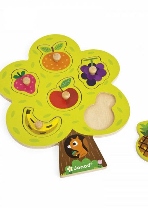 a wooden puzzle with fruits and nuts