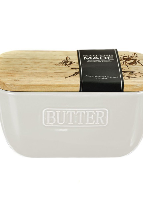 a white container with a wooden lid