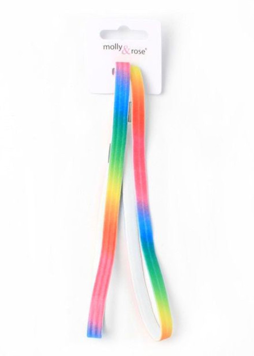 a rainbow colored strap on a white background