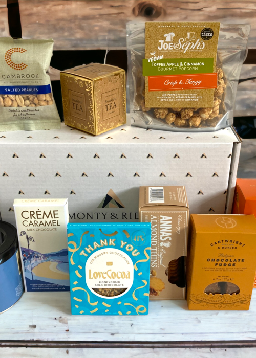 a group of boxes and containers on a table