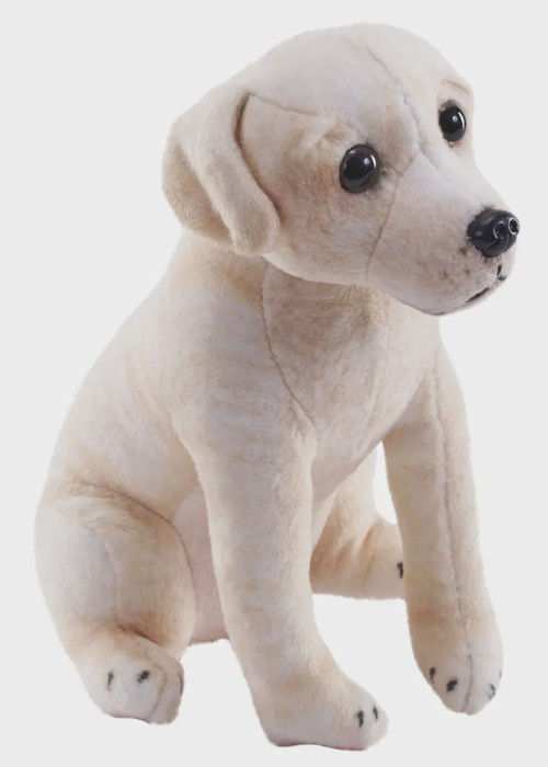 a stuffed dog toy sitting