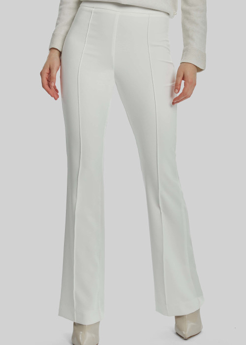 a person wearing white pants