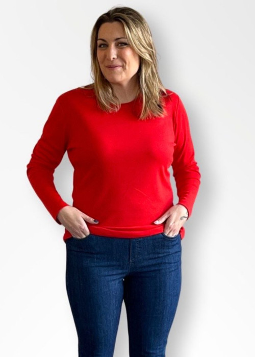 a woman in a red shirt