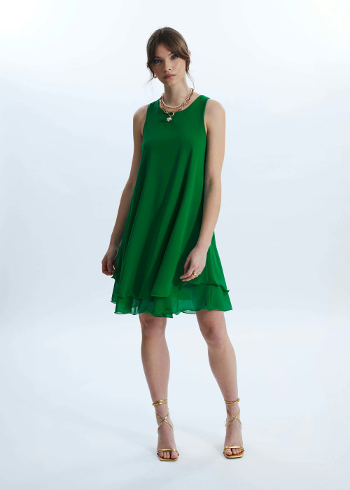 a woman in a green dress