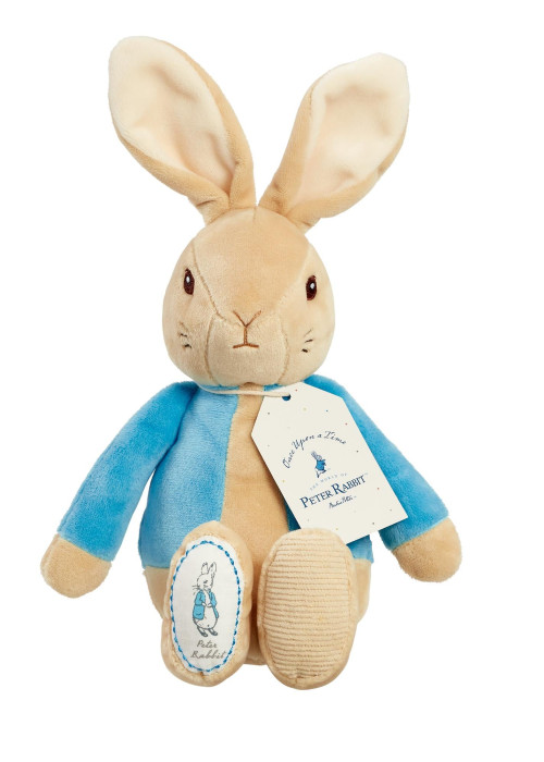a stuffed animal rabbit with a tag