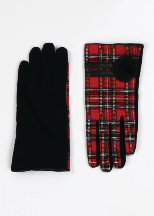 a pair of gloves with a pom