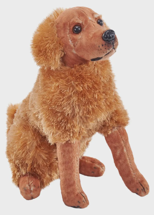 a stuffed dog toy sitting