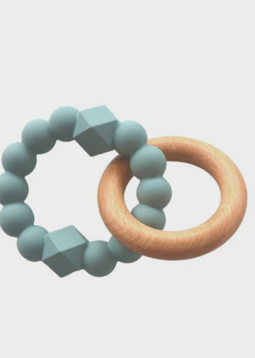 a baby rattle with a wooden ring