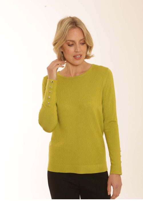 a woman in a green sweater