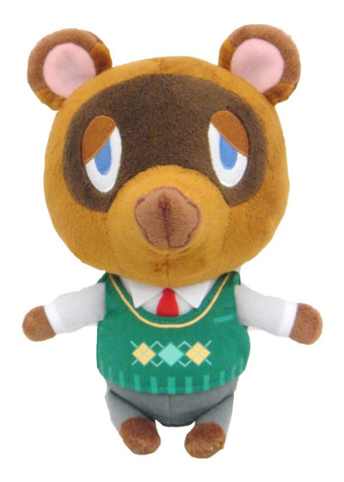 a stuffed animal toy with a sweater vest and tie